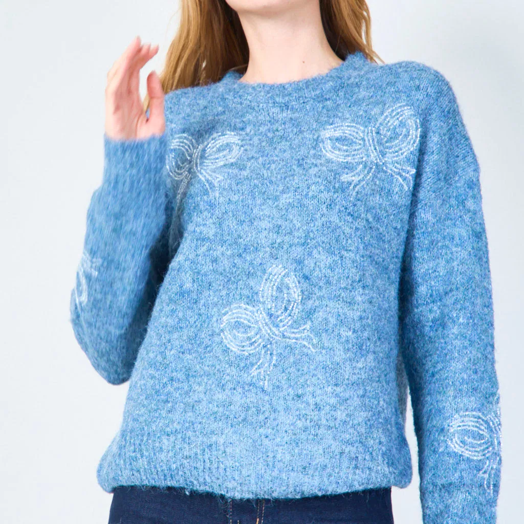 Soft knit sweater with subtle embroidery wholesale