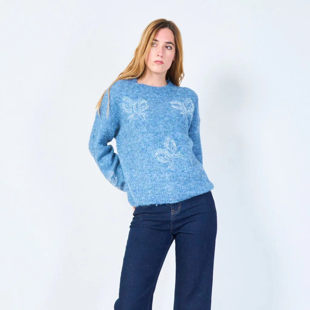 Soft knit sweater with subtle embroidery wholesale