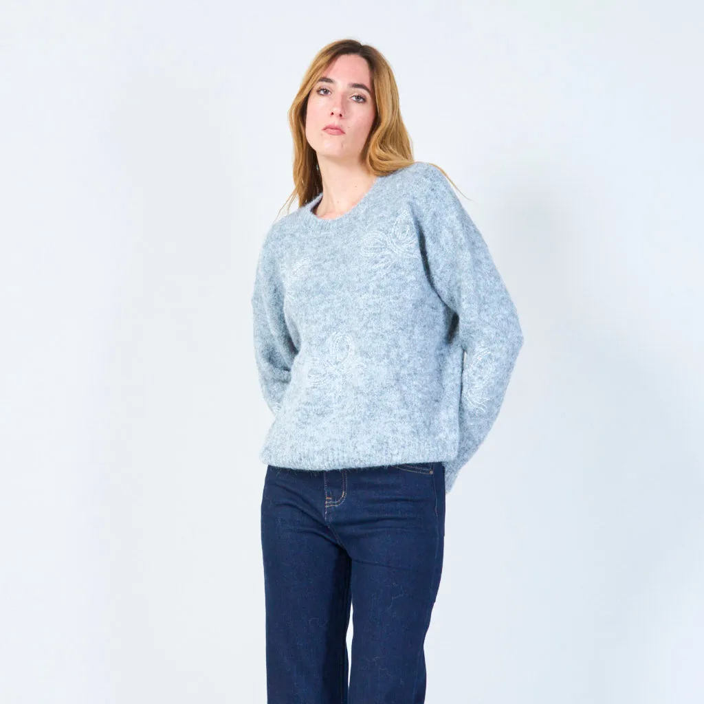 Soft knit sweater with subtle embroidery wholesale